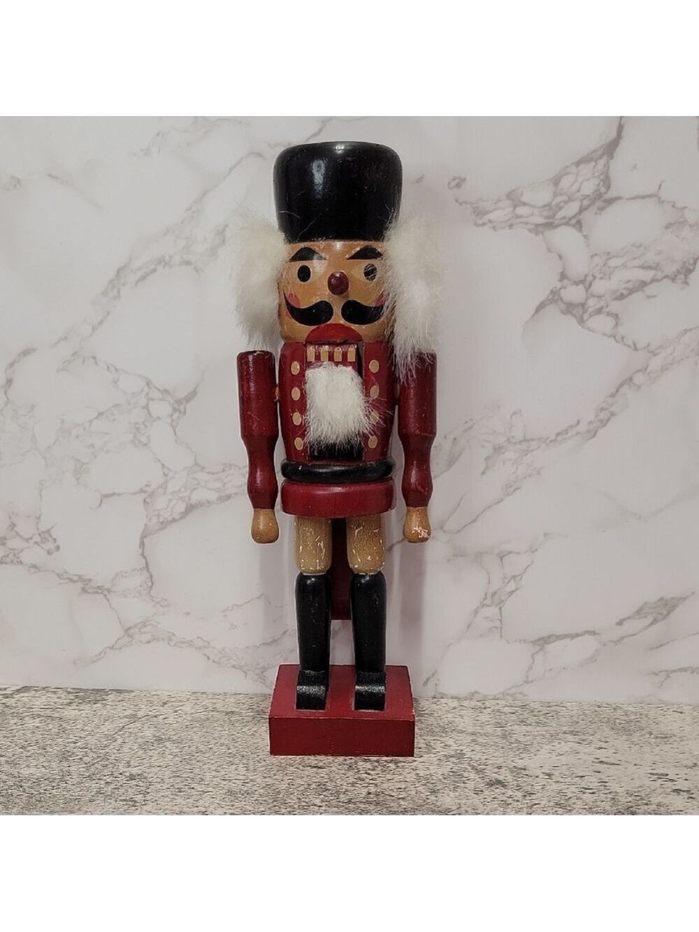 Vintage Wooden Nutcracker with Regal Detailing